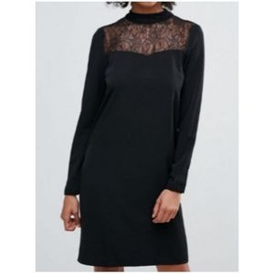 Midi length black dress